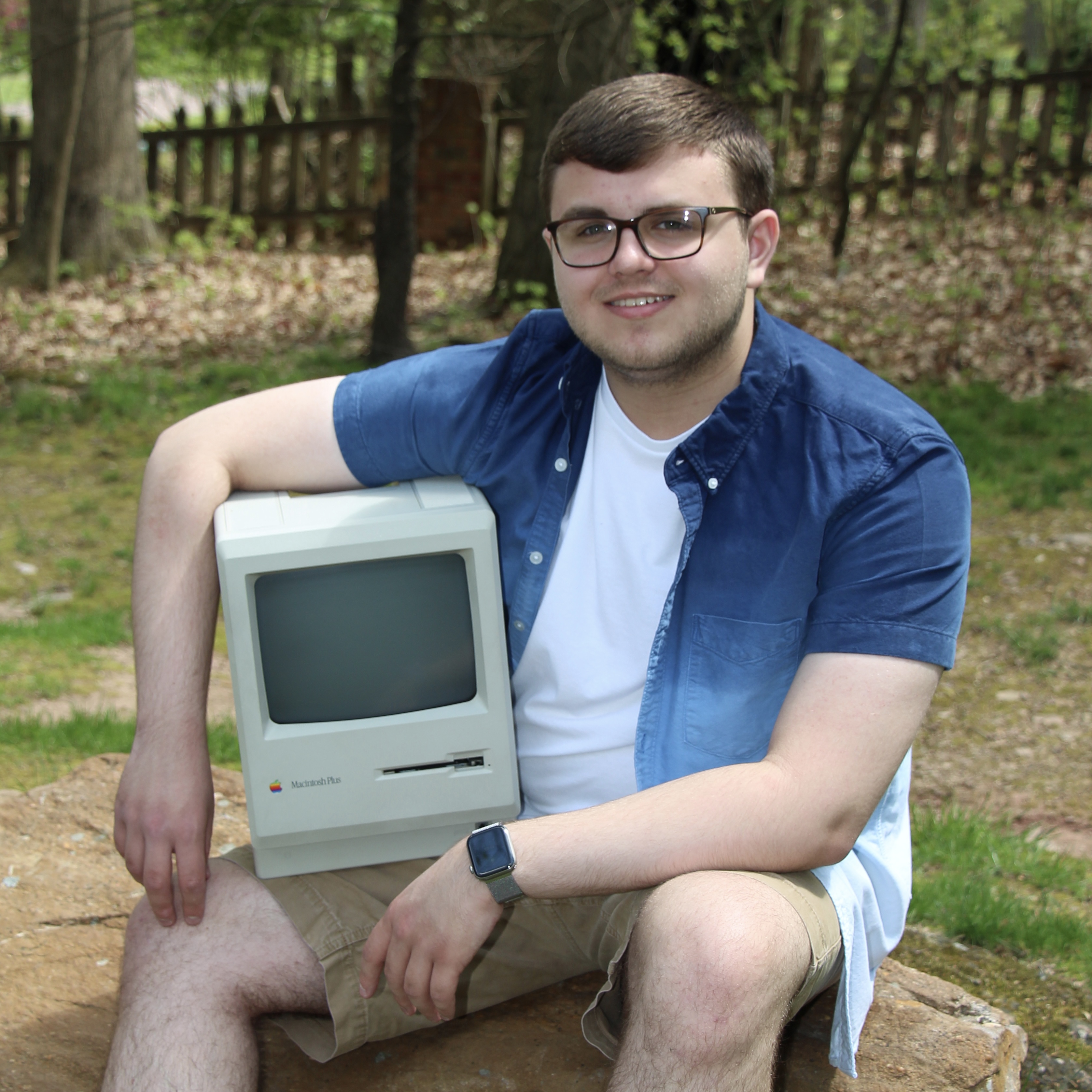 Caden McBride holding Macintosh Plus